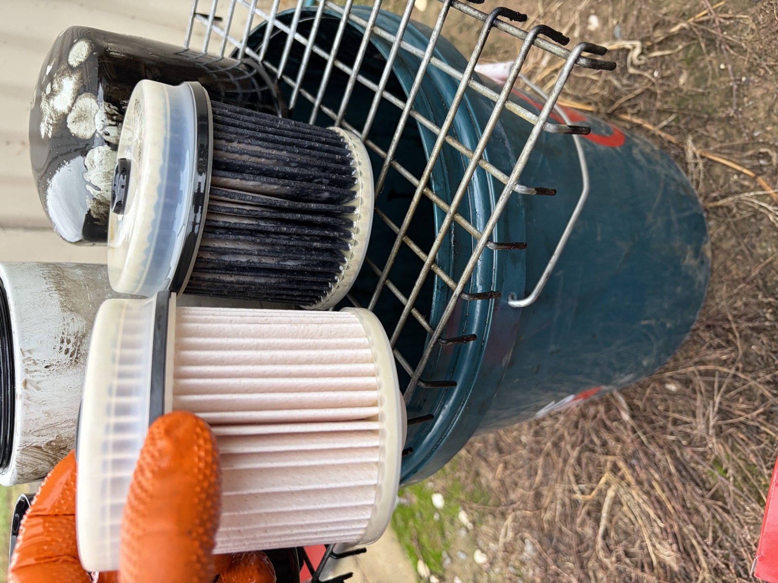 Old and new filters replaced during a logbook service